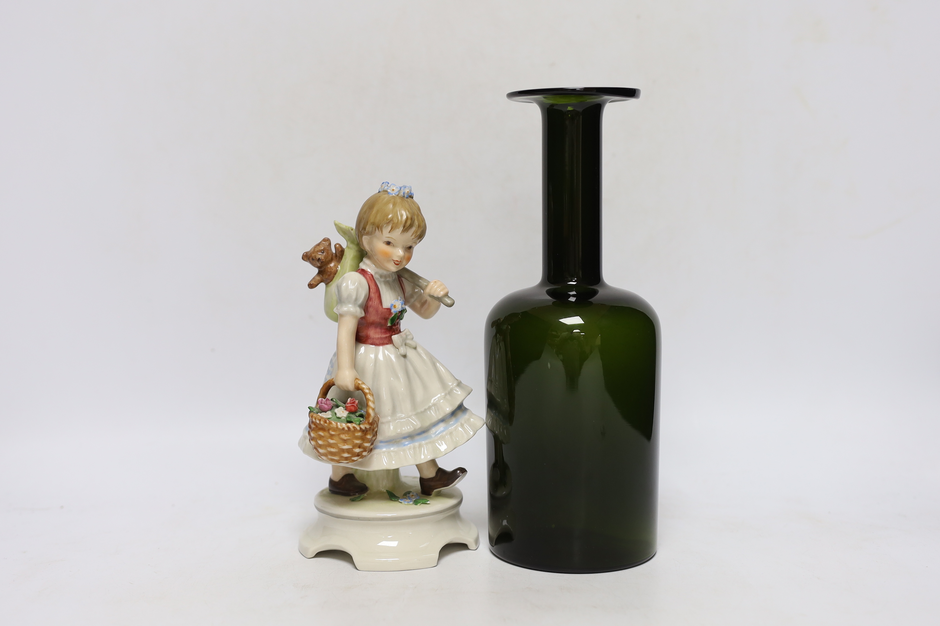 A 1960's Swedish green glass bottle vase and a Goebel figure group, Garden Princess, largest 25cm high